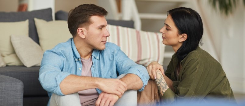 couple sitting and talking